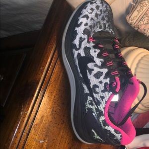 Black cheetah nikes. Used - good condition